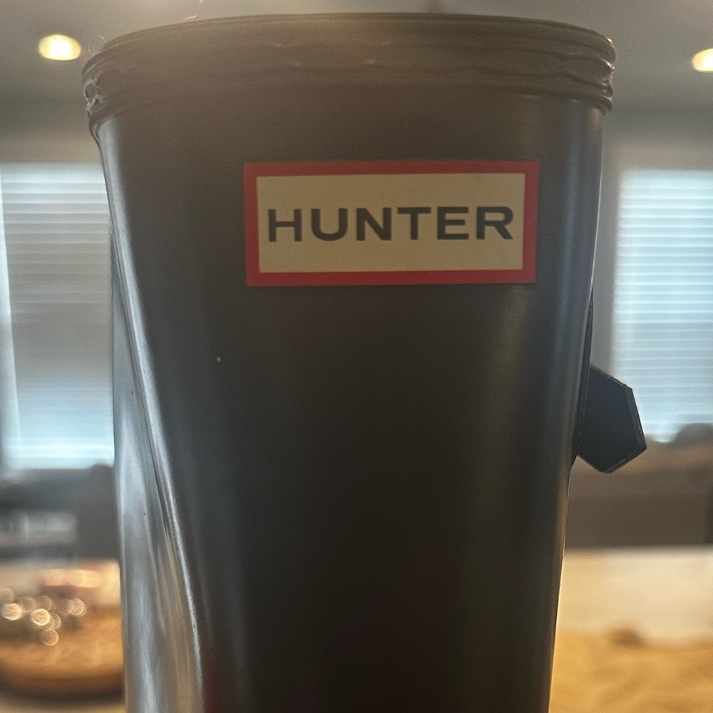 Hunter rain boots in good used condition with boot socks